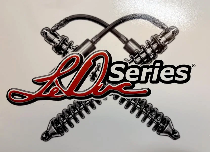 Skyjacker LeDuc Series logo with crossing coilover shock absorbers
